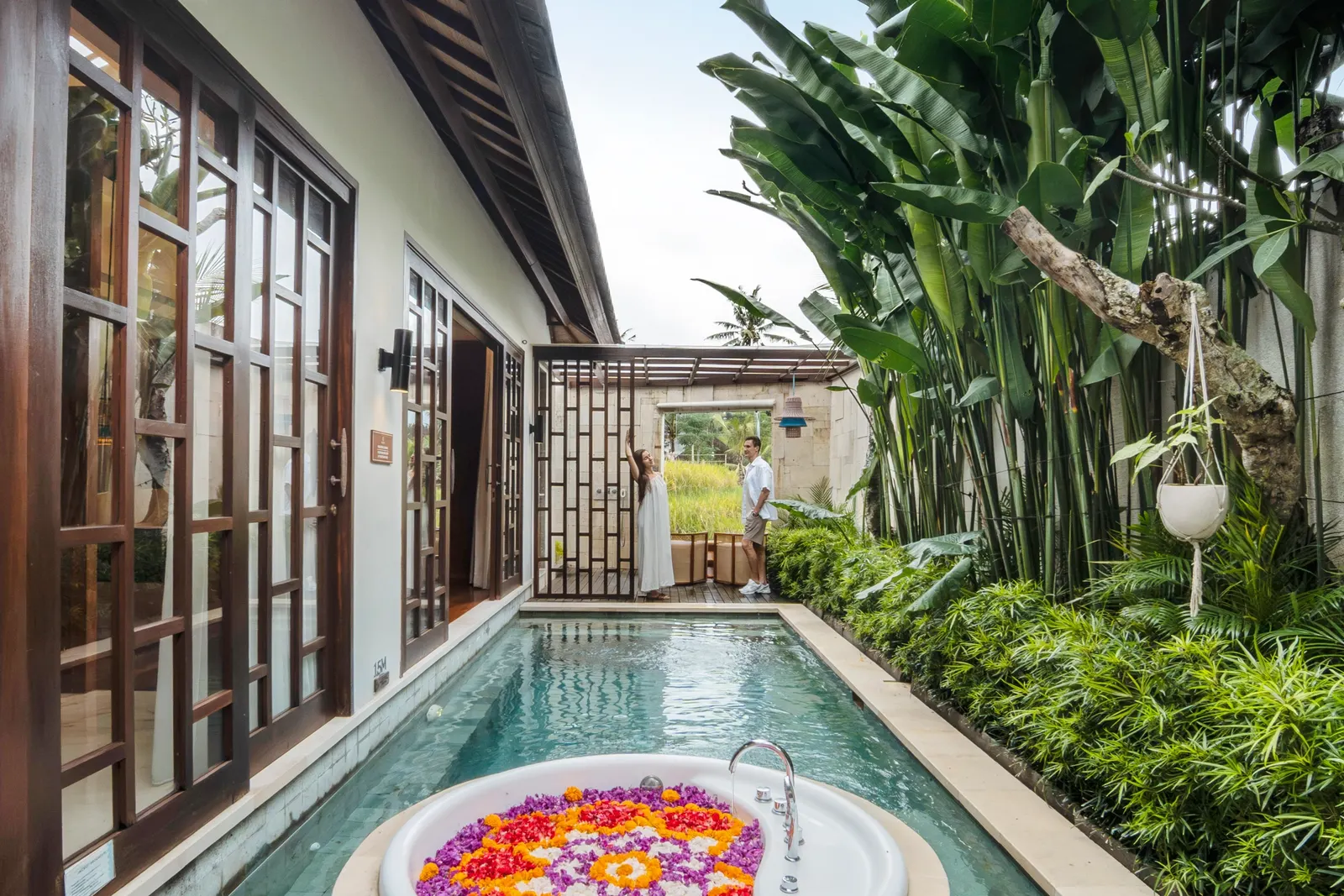 Private pool and flower-filled Jacuzzi at Asvara Villa Ubud
